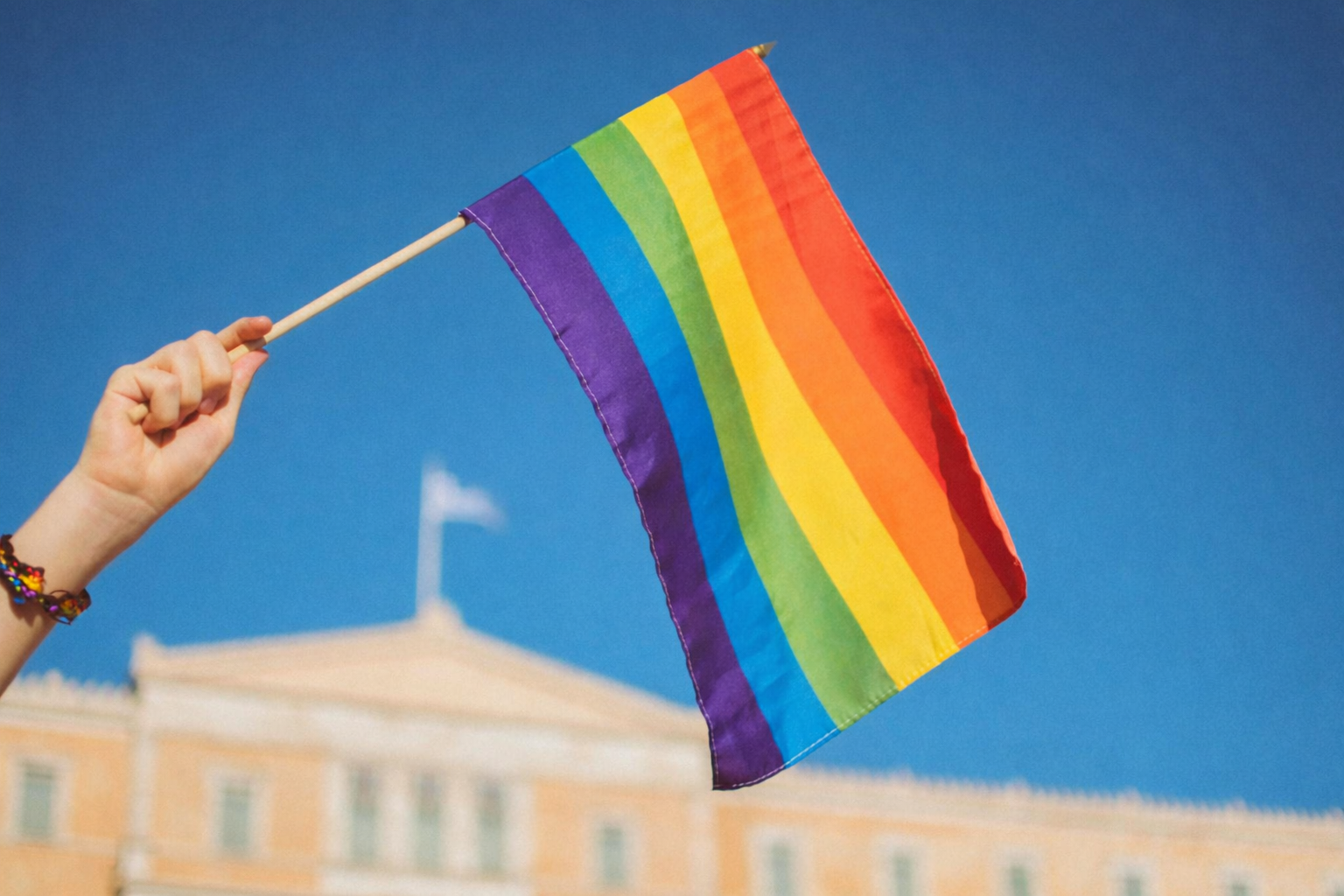 Rainbow flag reinforcing the LGBTQI+ angle of a trip to Greece